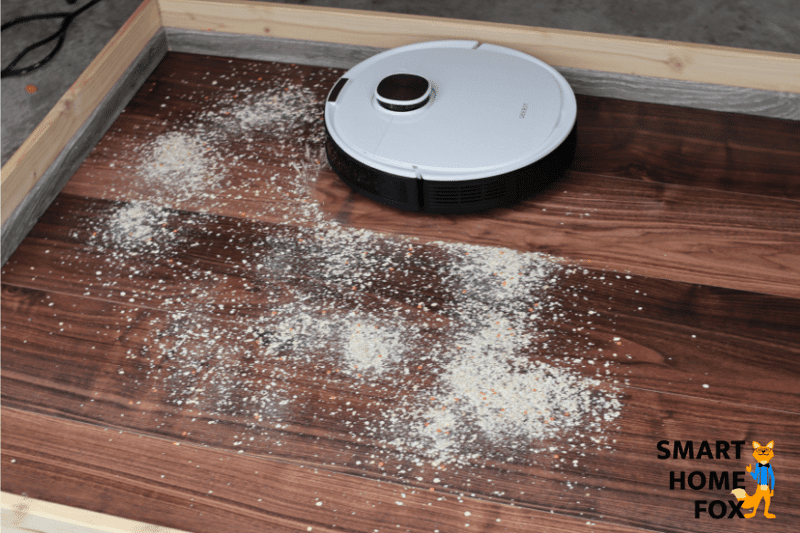 The Ecovacs Deebot OZMO T8 cleans oatmeal during the suction test on laminate flooring